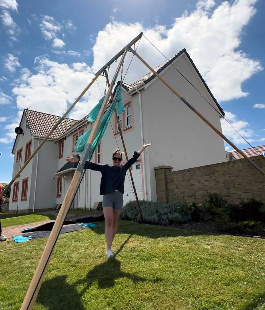 After setting up the large airframe in her garden, Debbie looks happy, complete with an attached hammock.